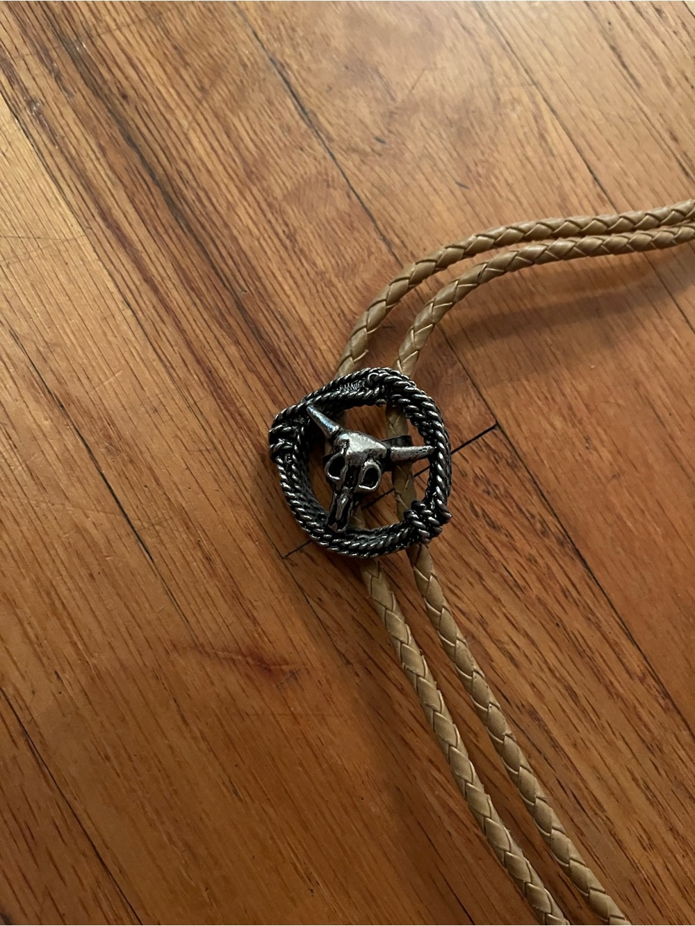 Vintage Bull Skull Bolo Tie with Tan Braided Cord and metal tips